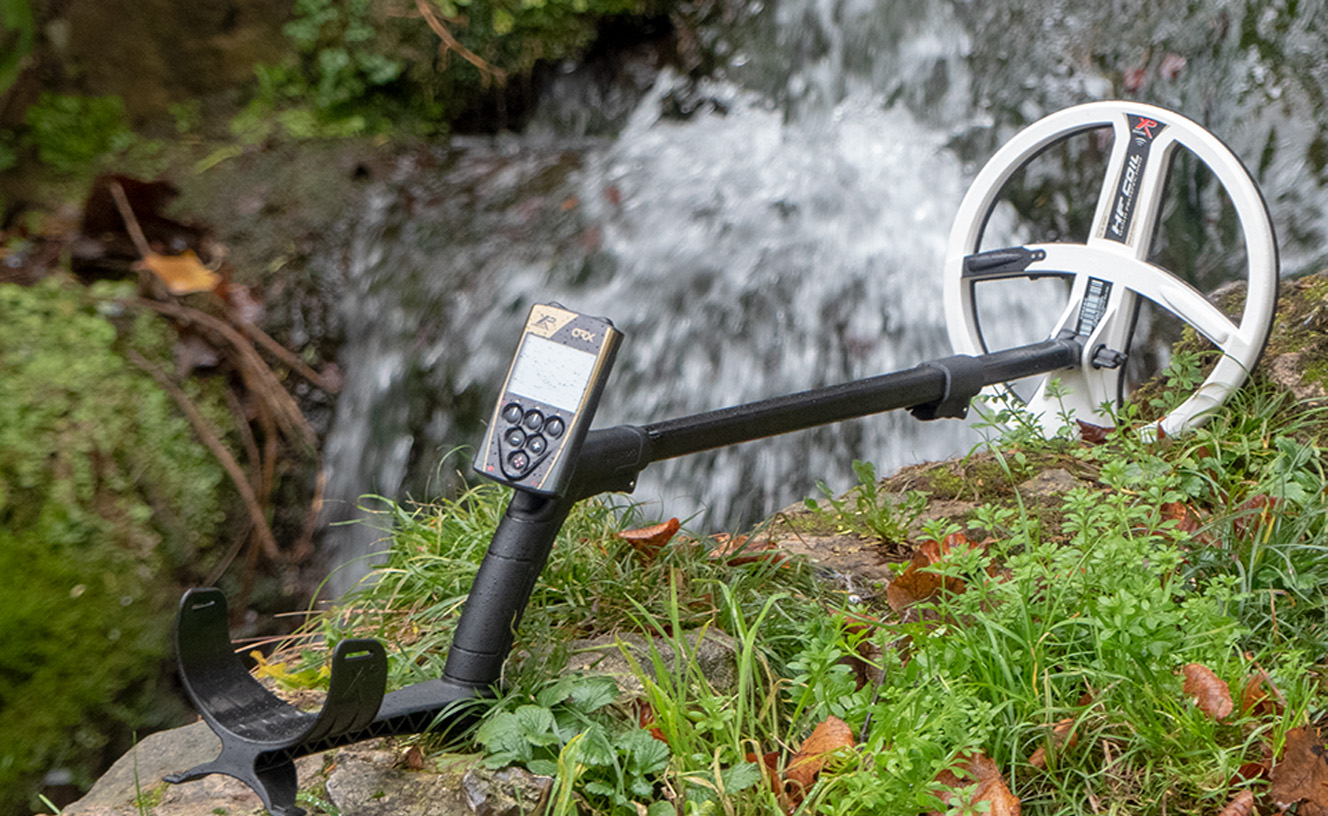 XP ORX metal detector pictured near a waterfall